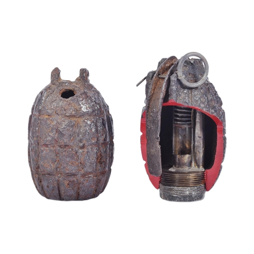 58 - Two WWII Second World War British Army Mills Bomb hand grenades. One a demonstration / educational e... 