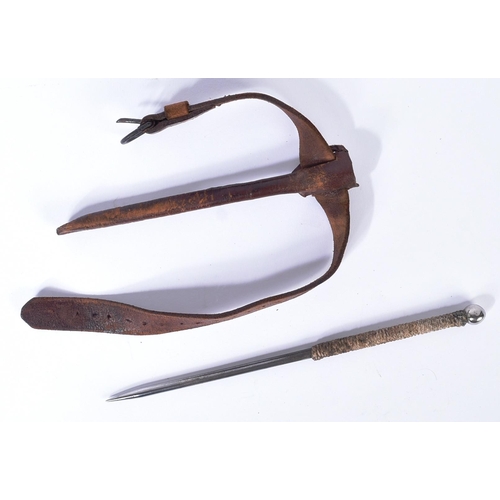 60 - An original WWII Second World War period spine / stiletto dagger, complete with holster and strap. T... 