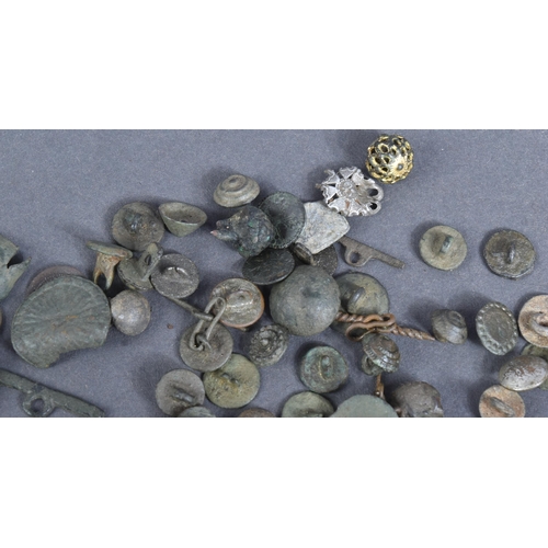 67 - A collection of assorted post-medieval / 15th / 16th / 17th & 18th century buttons and other types o... 