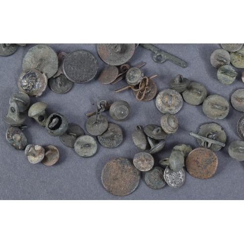 67 - A collection of assorted post-medieval / 15th / 16th / 17th & 18th century buttons and other types o... 