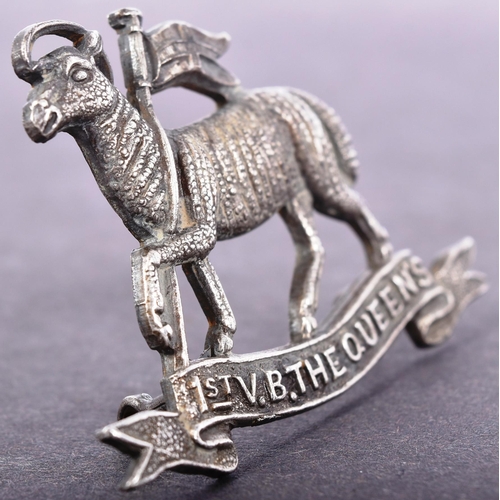 68 - A WWI First World War British 1st Volunteer Battalion - The Queens Regiment silver cap badge. The ba... 