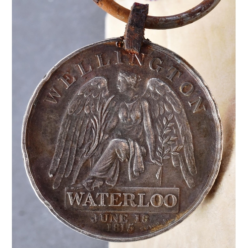 7 - A Napoleonic War era Battle of Waterloo campaign medal awarded to one Lieut Edward Hamil of the 1st ... 