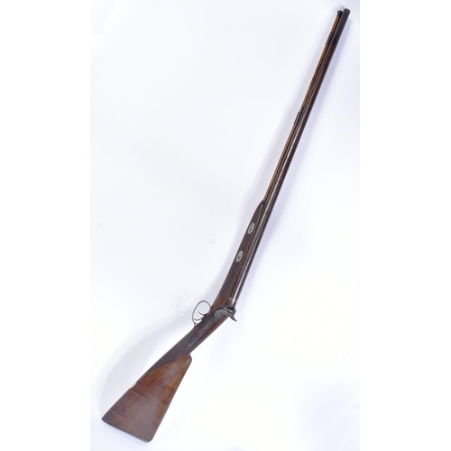 510 - An antique early 19th century large double-barrelled muzzle-loading percussion rifle by Hollis & She... 