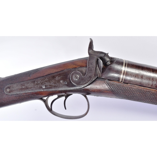 510 - An antique early 19th century large double-barrelled muzzle-loading percussion rifle by Hollis & She... 