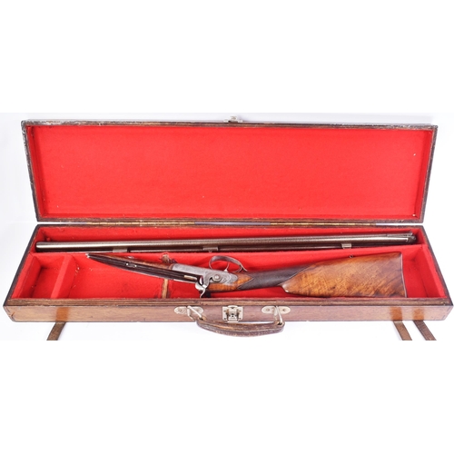 514 - An antique 19th century cased muzzle-loading double-barrelled percussion sporting rifle by Guarain o... 