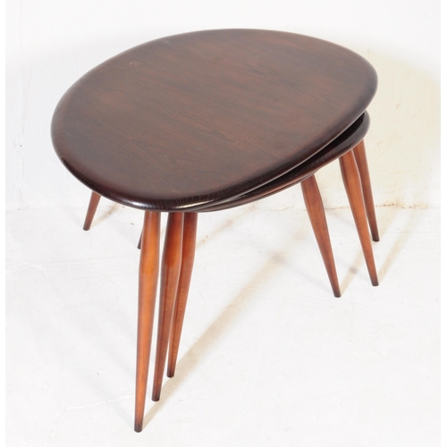 10 - Lucian Ercolani for Ercol - Model 354 - A retro 1960s beech and elm wood set of 'Pebble' nesting tab... 