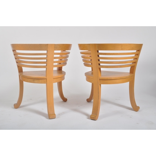 116 - A pair of retro vintage 20th century teak conservatory patio tub armchairs / chairs. Each armchair h... 