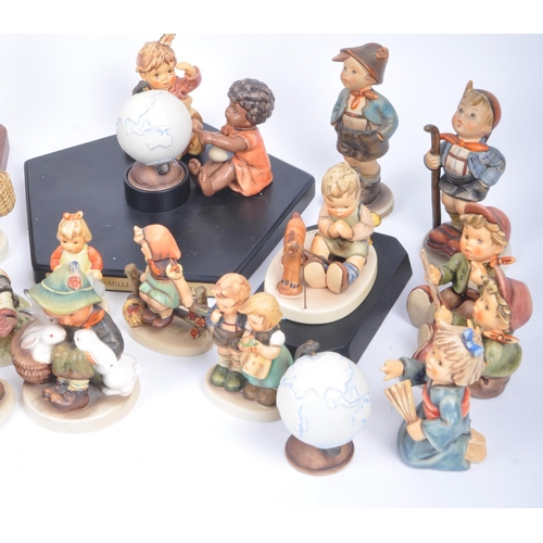 127 - M. J. Hummel by Goebel - A large collection of vintage 20th century Goebel porcelain china figurines... 