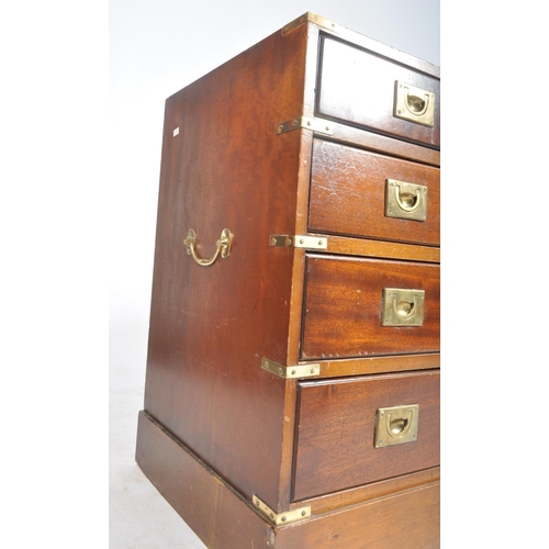 134 - A retro vintage 20th century mahogany campaign style brass bound chest sideboard. The chest of drawe... 