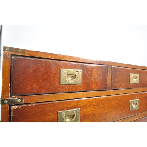 134 - A retro vintage 20th century mahogany campaign style brass bound chest sideboard. The chest of drawe... 