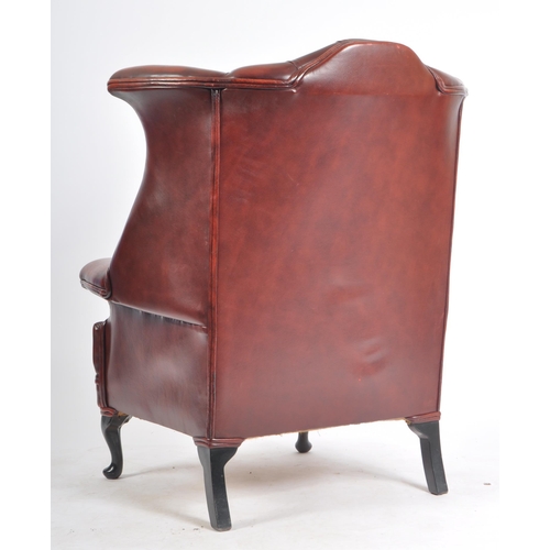 137 - A vintage 20th century Chesterfield style Queen Anne Revival wingback ox blood leatherette armchair ... 