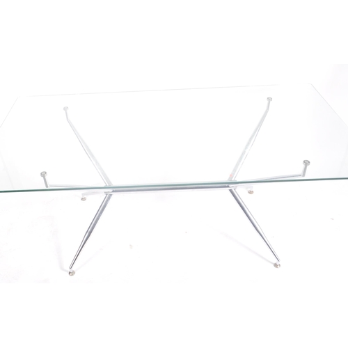 150 - A large retro vintage 20th century glass & chrome low occasional coffee table. The table having a re... 