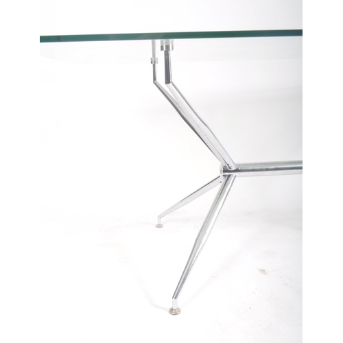 150 - A large retro vintage 20th century glass & chrome low occasional coffee table. The table having a re... 