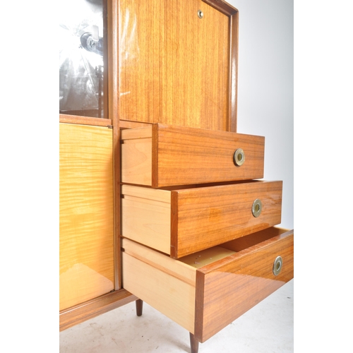 158 - A retro vintage mid 20th century walnut veneered cocktail cabinet highboard having a glazed sliding ... 