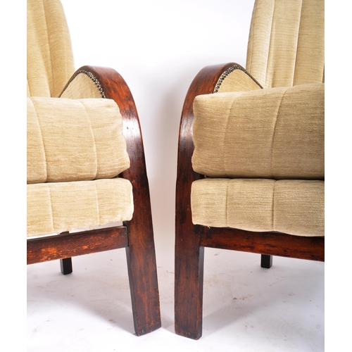 182 - A matching pair of vintage 20th century Art Deco continental bentwood armchairs. The chairs being re... 