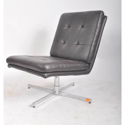 188 - A contemporary dark brown leather swivel lounge chair / lobby chair having removable button backed s... 