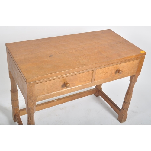 2 - Robert ' Mouseman ' Thompson of Kilburn - A solid English oak hand carved two drawer hall side table... 