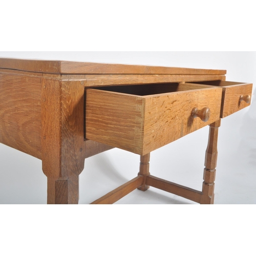 2 - Robert ' Mouseman ' Thompson of Kilburn - A solid English oak hand carved two drawer hall side table... 