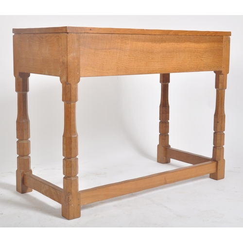 2 - Robert ' Mouseman ' Thompson of Kilburn - A solid English oak hand carved two drawer hall side table... 