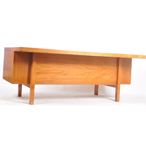 245 - Gordon Russell - A large retro vintage mid 20th century circa 1960s designer teak desk. The desk hav... 