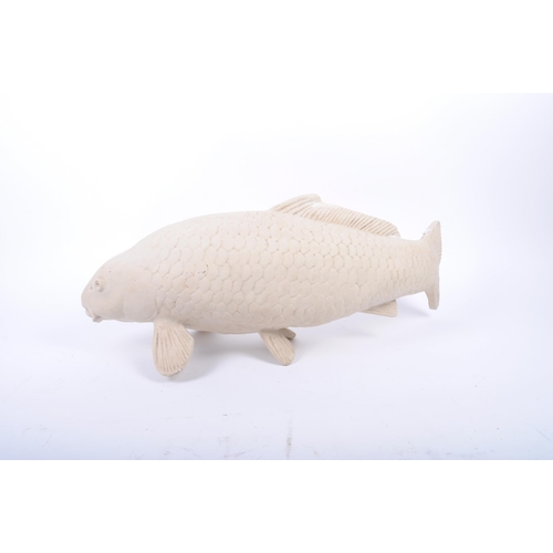 258 - A large contemporary hand moulded gesso / plaster sculpture of koi fish carp. The figure with molded... 