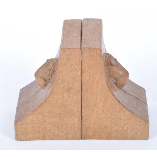 27 - Robert ' Mouseman ' Thompson of Kilburn - A pair of solid English oak hand carved bookends. Each boo... 