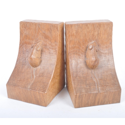 27 - Robert ' Mouseman ' Thompson of Kilburn - A pair of solid English oak hand carved bookends. Each boo... 