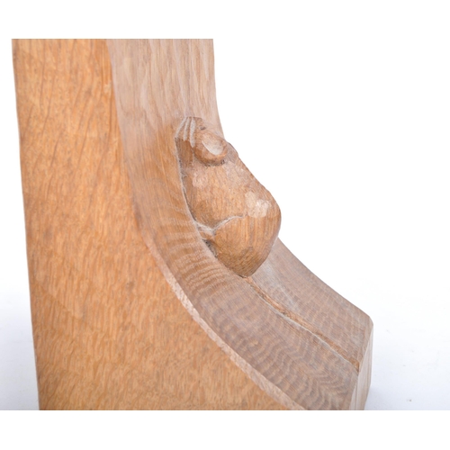 27 - Robert ' Mouseman ' Thompson of Kilburn - A pair of solid English oak hand carved bookends. Each boo... 