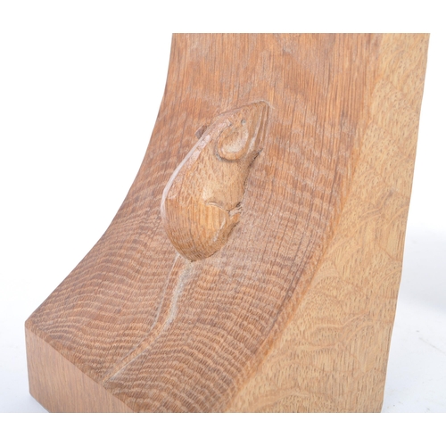 27 - Robert ' Mouseman ' Thompson of Kilburn - A pair of solid English oak hand carved bookends. Each boo... 