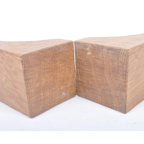 27 - Robert ' Mouseman ' Thompson of Kilburn - A pair of solid English oak hand carved bookends. Each boo... 