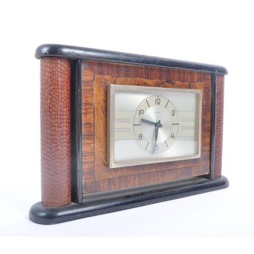 276 - A vintage 20th century circa 1930s Italian Di Meglio figured walnut mantel desk clock. The clock hav... 