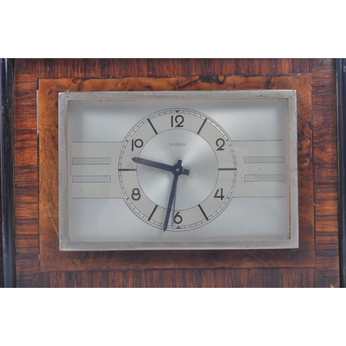 276 - A vintage 20th century circa 1930s Italian Di Meglio figured walnut mantel desk clock. The clock hav... 