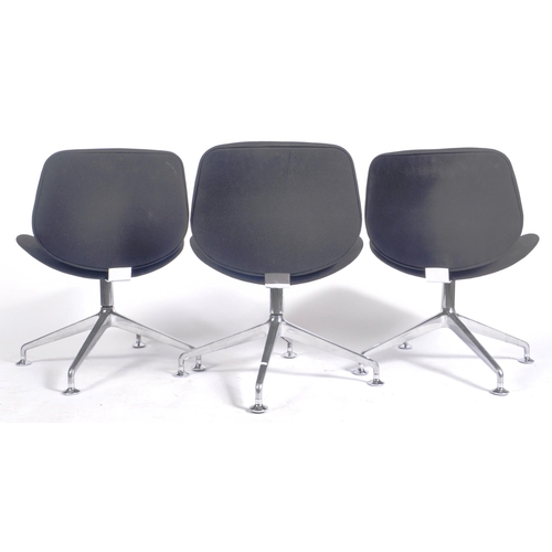 313 - Orange Box - A set of three contemporary designer swivel lounge chairs / lobby office chairs in the ... 