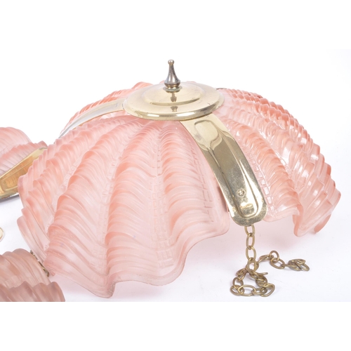 36 - A set of Art Deco 20th century 1930s salmon opaque glass clam shell wall ceiling light shades. The l... 