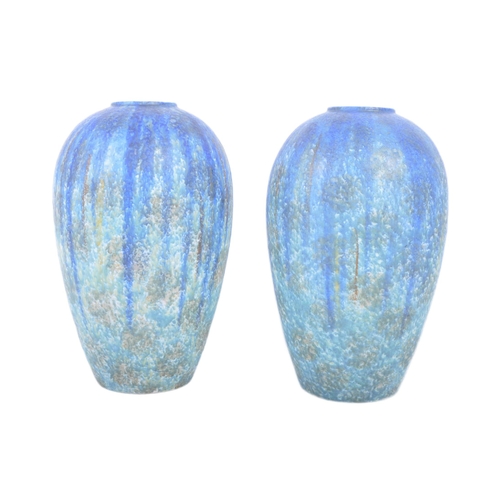 410 - A pair of early 20th century circa 1900 Bretby of Barnstaple, Devon studio art pottery vases. Each o... 