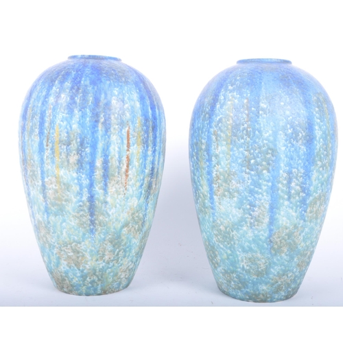 410 - A pair of early 20th century circa 1900 Bretby of Barnstaple, Devon studio art pottery vases. Each o... 