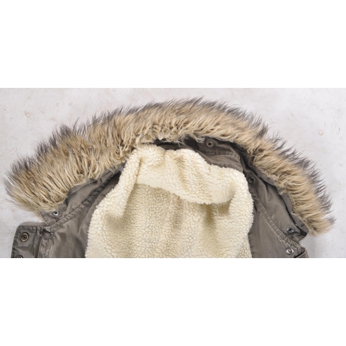 416 - The Who - Quadrophenia - A contemporary unbranded Parka jacket in dark green featuring the iconic Qu... 