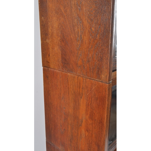 51 - Lebus Furniture -  Edwardian Industrial Lebus mahogany four section - stacking lawyers breakfront bo... 