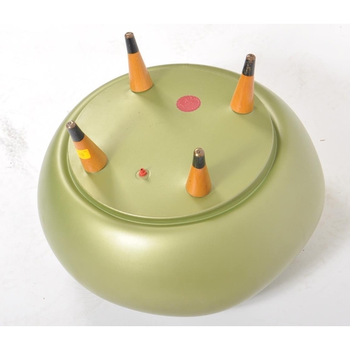 53 - A vintage retro mid 20th century kitsch Puffin inflatable lustre effect green foot stool pouffe. The... 