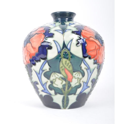 63 - A retro vintage late 20th century circa 1998 Moorcroft pottery ceramic baluster shaped vase in the P... 