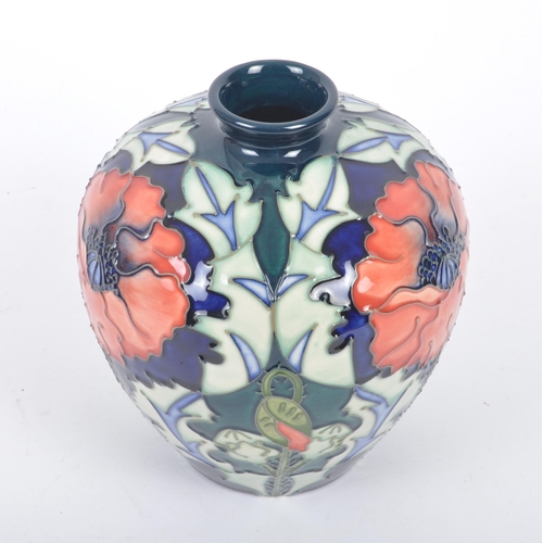 63 - A retro vintage late 20th century circa 1998 Moorcroft pottery ceramic baluster shaped vase in the P... 