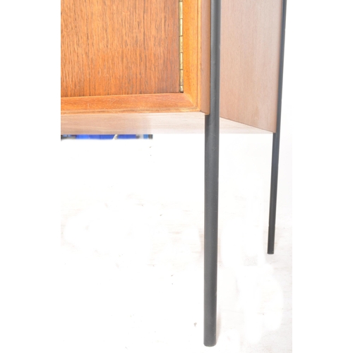 66 - Peter Hayward for Vanson - A retro mid 20th century teak cupboard cabinet having twin doors cupboard... 