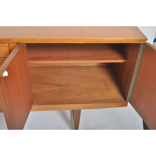 69 - Beautility - A retro vintage 20th century 1970s teak wood sideboard credenza. The sideboard having a... 