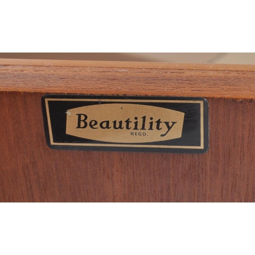69 - Beautility - A retro vintage 20th century 1970s teak wood sideboard credenza. The sideboard having a... 