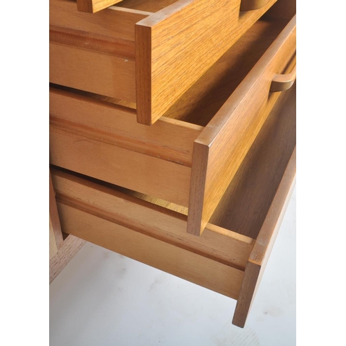 69 - Beautility - A retro vintage 20th century 1970s teak wood sideboard credenza. The sideboard having a... 