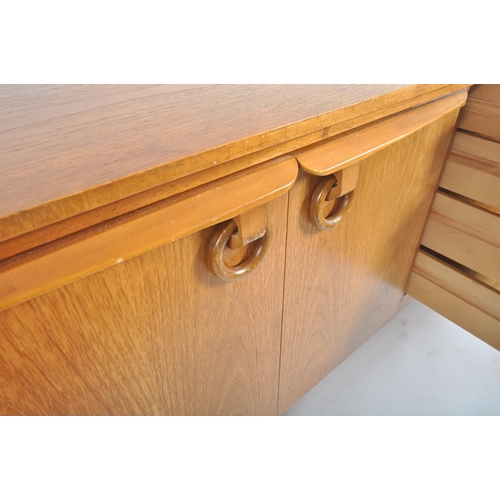 69 - Beautility - A retro vintage 20th century 1970s teak wood sideboard credenza. The sideboard having a... 