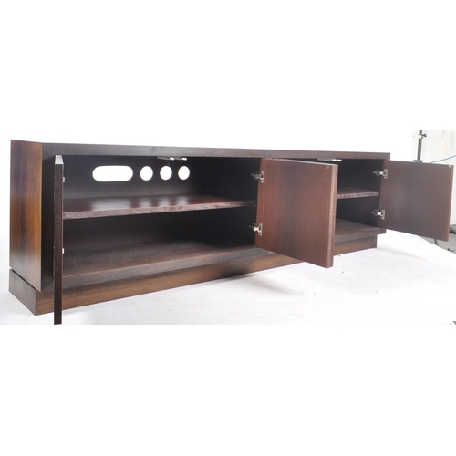 85 - A contemporary Wenge ( Millettia laurentii ) veneered low media / hi-fi unit sideboard credenza. The... 