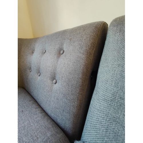 273 - A contemporary Made.com modular corner L shaped sofa settee. The sofa in a grey upholstery with butt... 