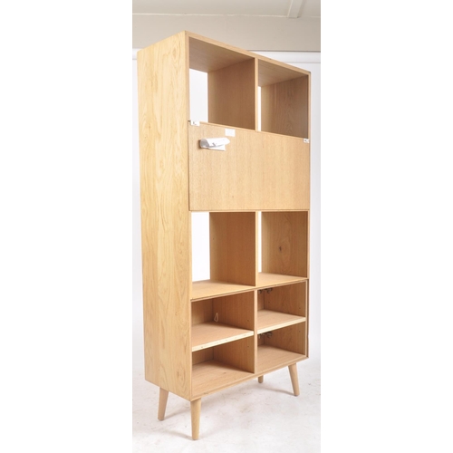627 - A contemporary Milano solid oak two door open display unit bookcase. The bookcase having straight to... 