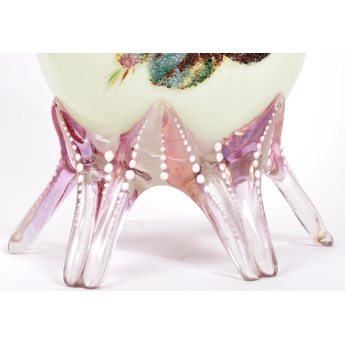 123 - An early 20th Century glass vase with a pair of bon bon dishes. All hand decorated with fauna and fl... 